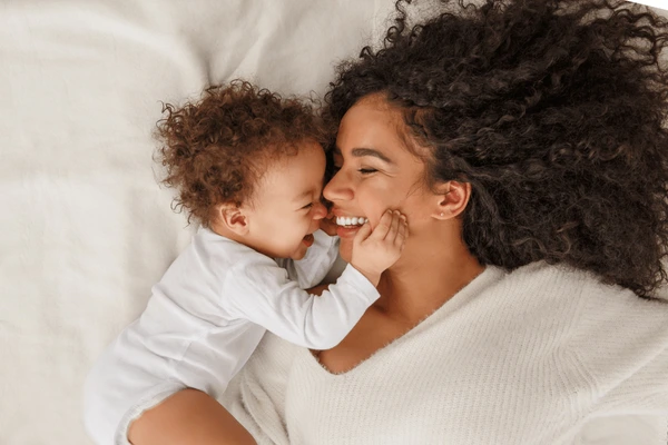 Healthy mother bonding with child